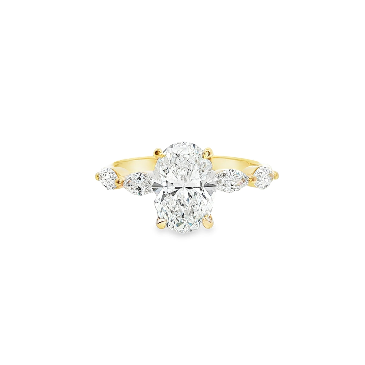 Oval Diamond with marquise diamonds ring