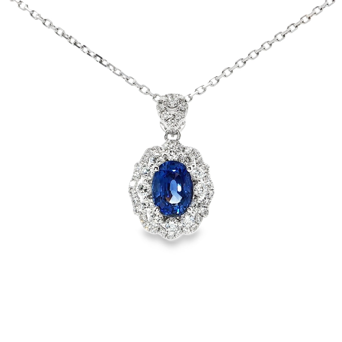 Vivid Blue Sapphire and White Gold Charm Necklace