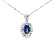 Vivid Blue Sapphire and White Gold Charm Necklace
