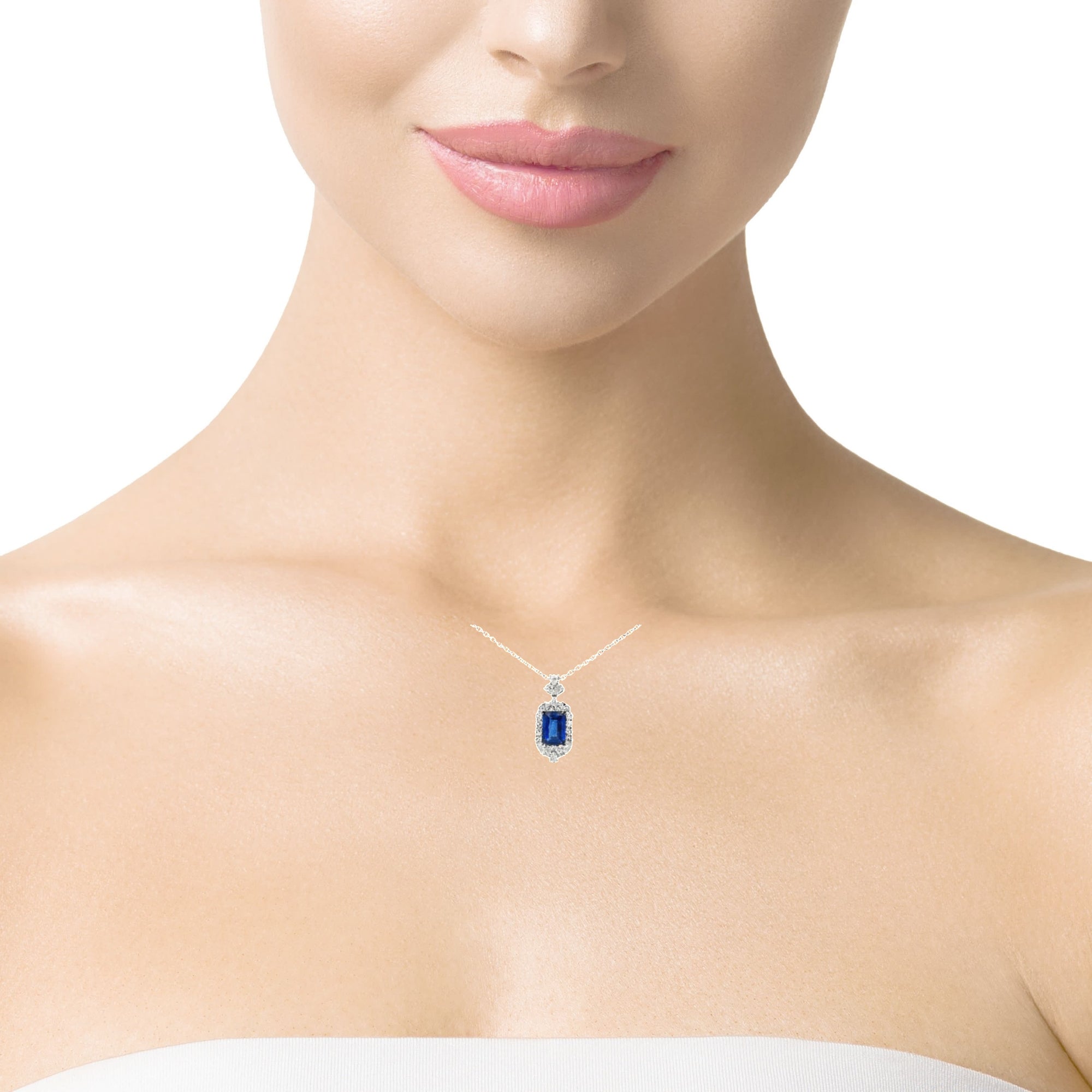 White Gold Charm Necklace with Deep Blue Emerald Cut Sapphire