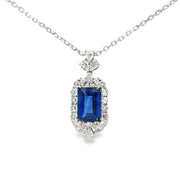 White Gold Charm Necklace with Deep Blue Emerald Cut Sapphire