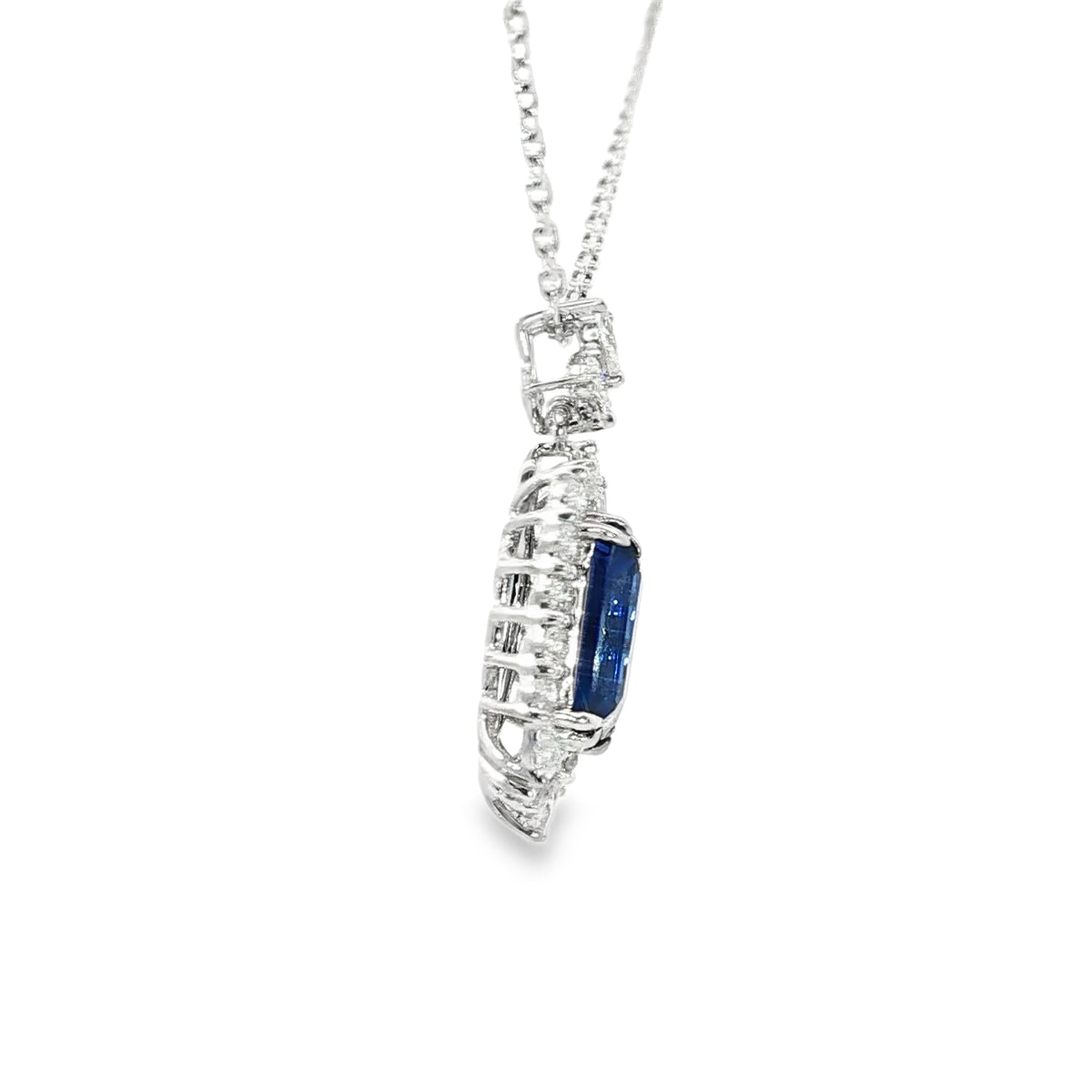 White Gold Charm Necklace with Deep Blue Emerald Cut Sapphire