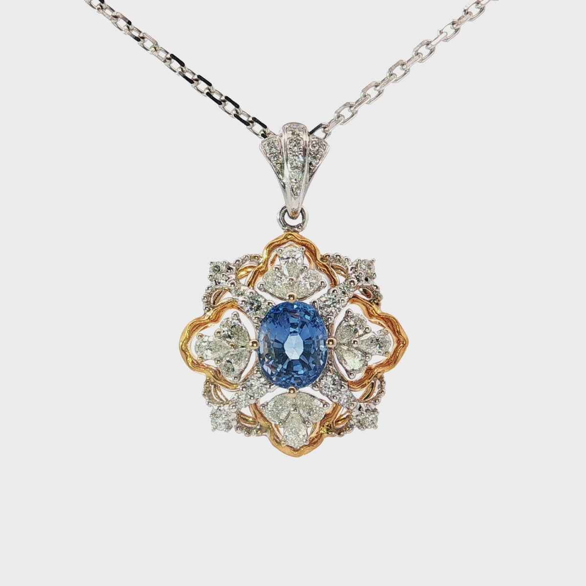 Load video: Gold Charm Necklace with Royal Blue Sapphire