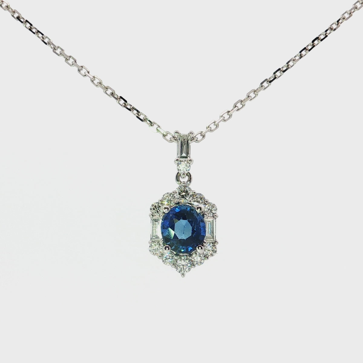 Load video: White Gold Necklace with Deep Blue Sapphire Charm